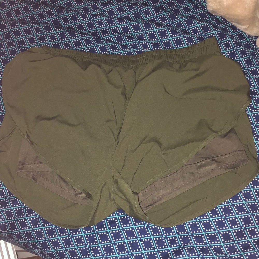 Shein dark green shorts with underneath spandex